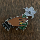 Hand Holding Jimson Weed Pin