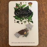 Hand Holding Jimson Weed Pin